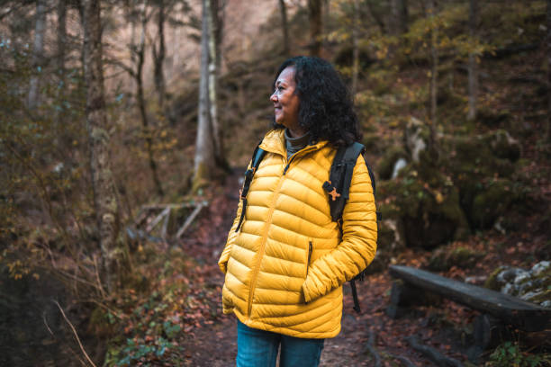 istock Active Mature Hispanic Female Hiking Alone In The Mountains 1441981523