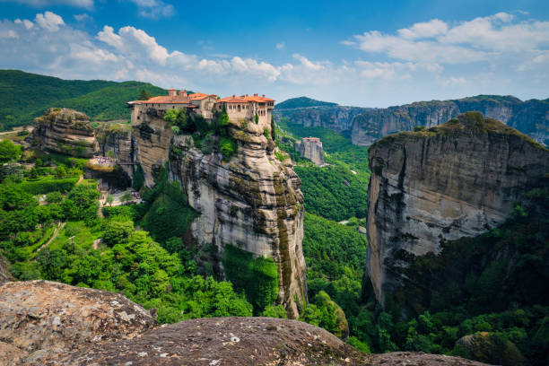 Monasteries of Meteora, Greece Monastery of Varlaam monastery and Monastery of Rousanou in famous greek tourist destination Meteora in Greece with scenic scenery landscape meteora stock pictures, royalty-free photos & images