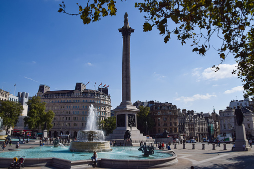 London, UK - September 22 2021: Nelson's Column and fountains at Trafalgar Square, daytime view with a blue sky