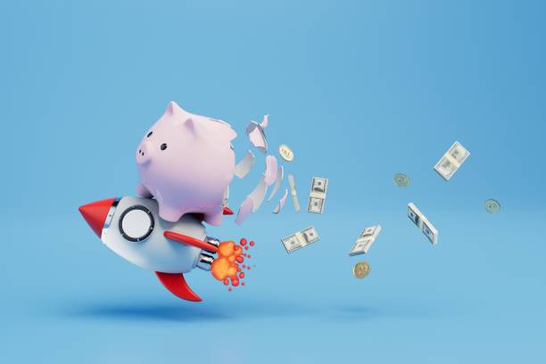 istock quick spending of savings. a flying rocket on which a broken piggy bank with money. 3D render 1441987407