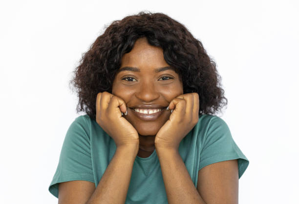 istock Smiling young woman with happy face 1441987524