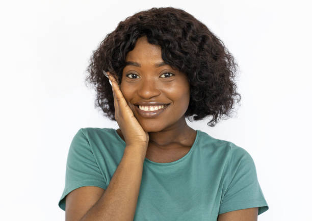 istock Pleased young woman smiling from hearing compliment 1441987528