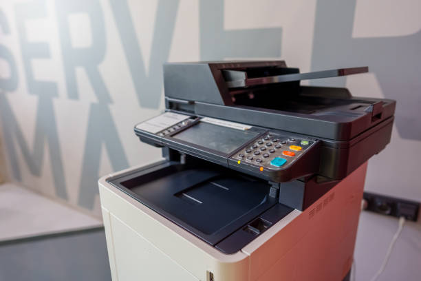 istock Multifunction printer equipment for scanning and copy paper in office 1441990553