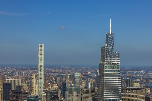 New York. USA. 09.21.2022. Beautiful panoramic view over Manhattan on blue sky background on bright September day.
