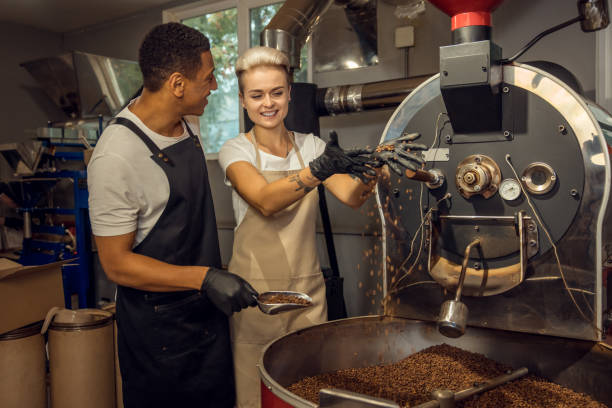 istock Roast masters working in a coffee company 1441996782