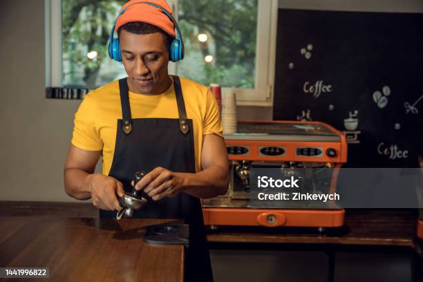 Professional Barista Making A Caffeinated Beverage To Music Stock Photo - Download Image Now