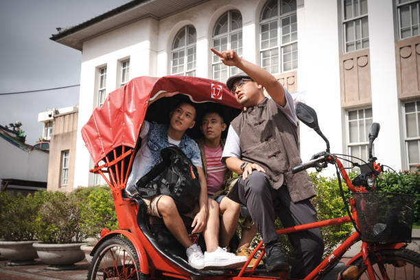 istock A Local Tour Guide Conducting a Sightseeing Tour with a Tricycle 1441998549