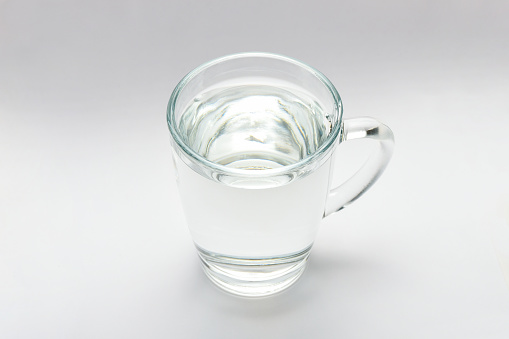 Closeup Glass of water on table nature background