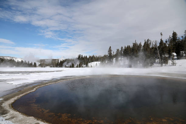 istock Upper Geyser Basin in Yellowstone 1441999375