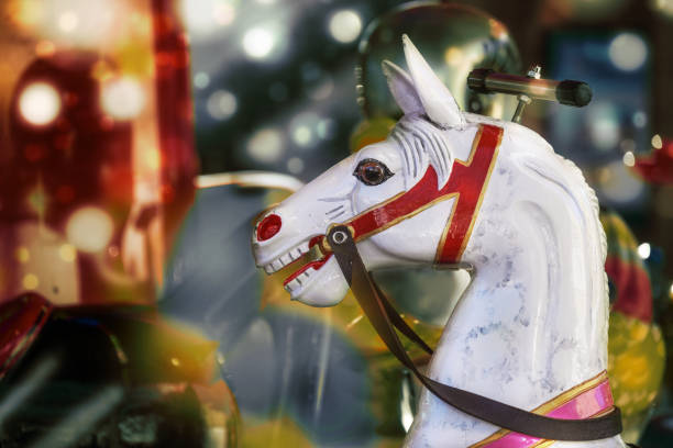 istock Horse head from a children carousel at a winter fair, copy space 1442001580