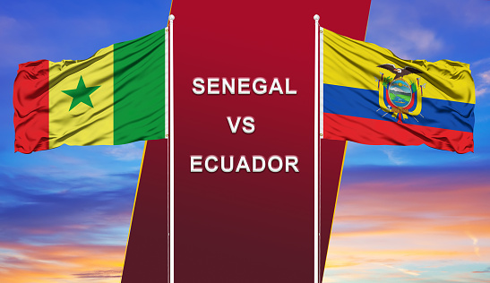 Ecuador vs. Senegal  two flags on flagpoles and blue cloudy sky background.Soccer matchday template
