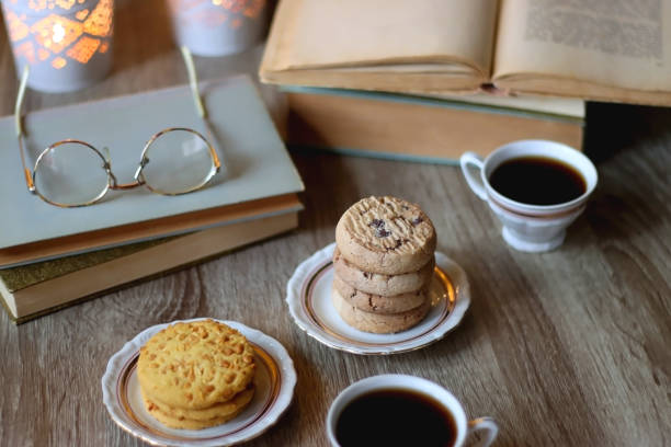 istock Cookies, Tea, Books and Candles 1442002350