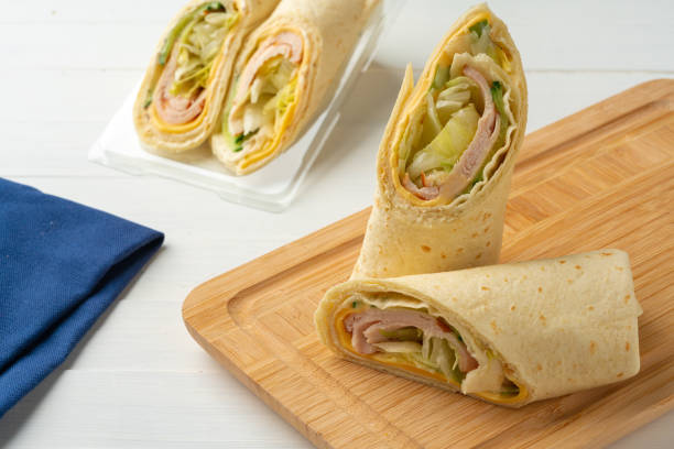 istock Fresh tortilla wraps with chicken and fresh vegetables 1442004355
