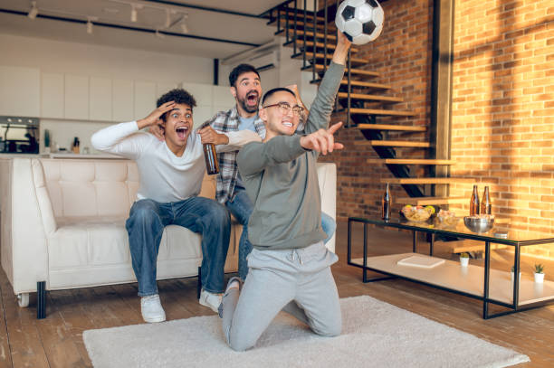 Emotional fans cheering for their favorite team