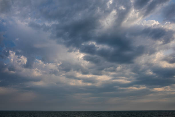 istock Storm clouds in the sky over the sea 1442007274