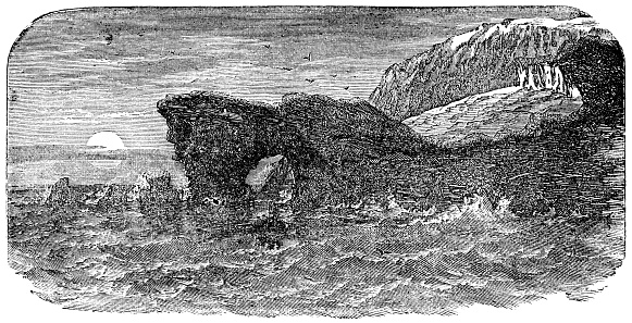 Dyrhólaey promontory rock formation on the coast of Iceland. Vintage etching circa 19th century.