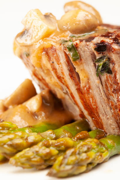 People eat healthy meals at served table dinner party.