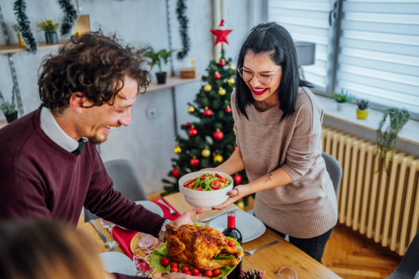 istock Friends setting up the table for Christmas lunch 1442016840