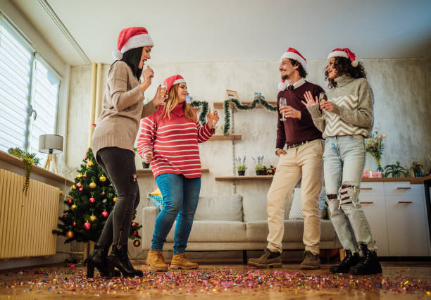istock Friends dancing during New Year's party at home 1442018485