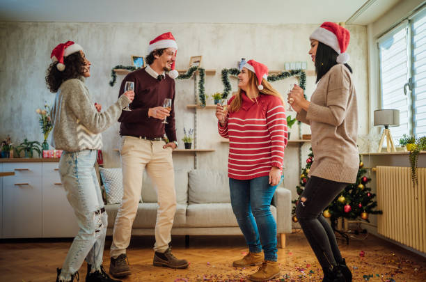 istock Friends dancing during New Year's party at home 1442018791