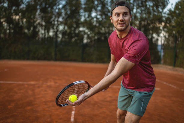 istock Tennis player serving outdoor 1442020252
