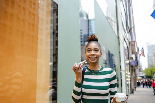 istock Young American woman on the move. Copy space. 1442027376