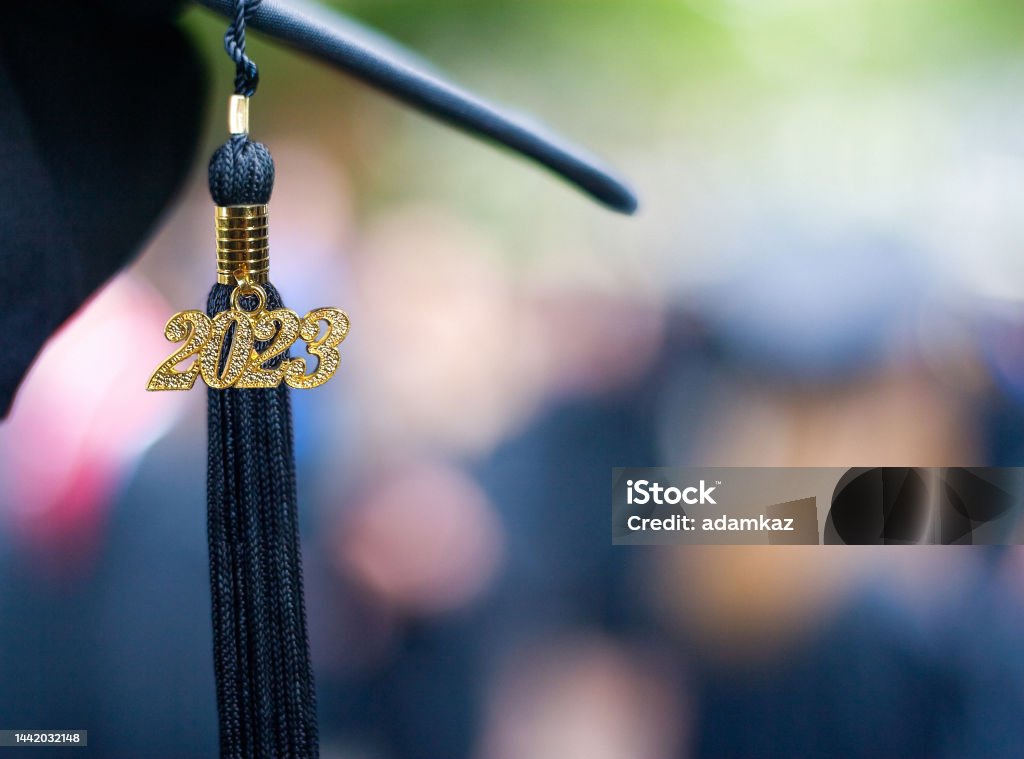 Class of 2023 Graduation Ceremony Tassel Black Closeup of a 2023 Graduation Tassel at a graduation ceremony. 2023 Stock Photo
