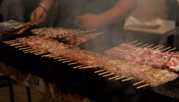 istock Preparing  Greek souvlakia on barbecue 1442032757