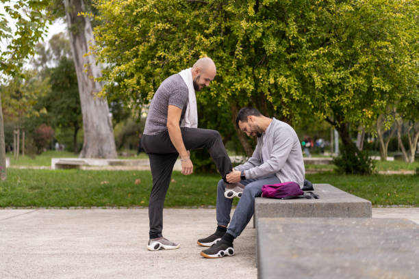 istock Athletes tying tennis laces 1442033398