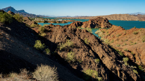 istock Tranquil southwestern desert wilderness  river and hilly landscape 1442035402