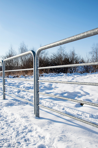 Metal barriers with winter scenery