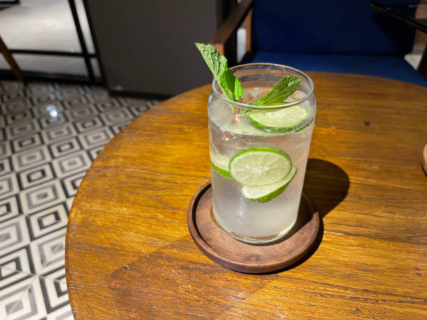 istock Mojito summer refreshing bar drinks cocktail with ice, lime and mint 1442039282