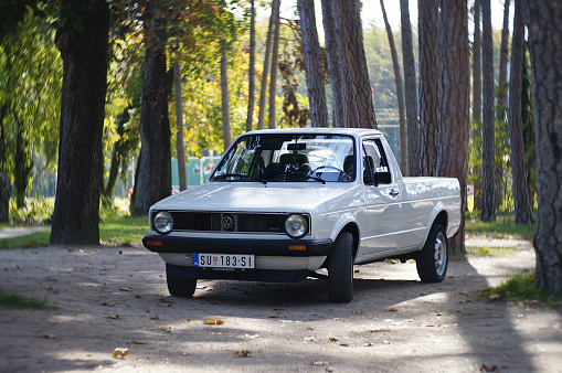 Perfect condition, white Volkswagen Caddy (1st generation based on Golf 1 platform) also known in USA as Rabbit Pickup is parked in Palic, Serbia, 21.10.2022