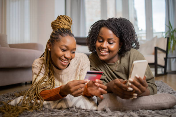 istock Girls shopping online 1442057362