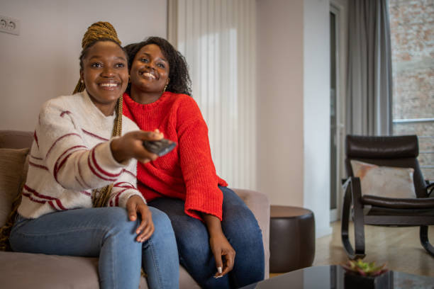 istock Sisters watching movie 1442059881