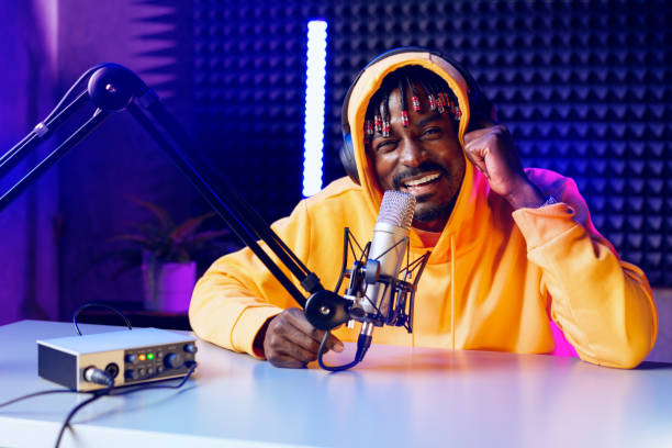 istock Happy young african man audio blogger broadcasting at studio 1442060618