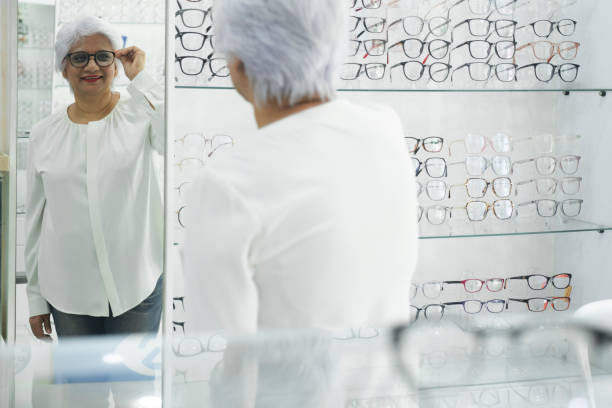 istock Woman trying new eyeglasses frame. 1442064586