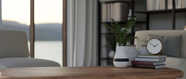 istock close-up image, Empty mockup space on wood coffee table over blurred modern living room 1442067066