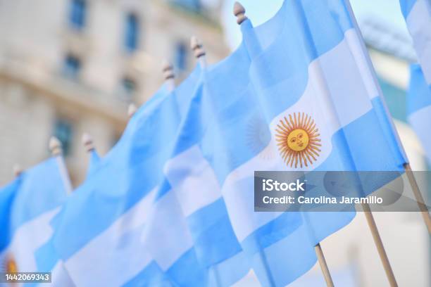 A Row Of Argentine National Flags Waving Outdoors Stock Photo - Download Image Now - Argentina, Buenos Aires, Flag