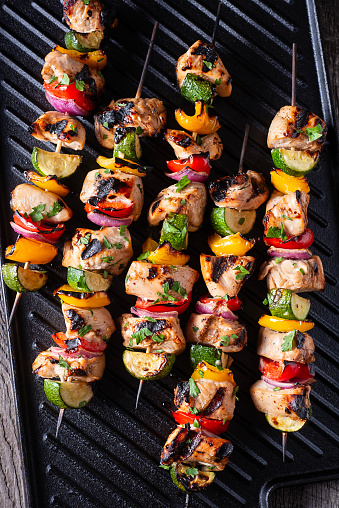 Grilled Kebabs on Cast Iron with Chicken, Bell Peppers, Zucchini and Onion