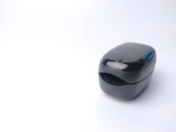 istock Malaysia,28 March 2022: Black oximeter on a white background with copy space 1442073517