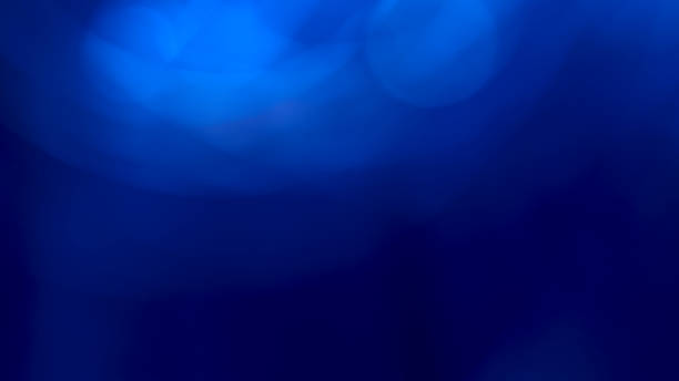 istock Abstract background in different shades of blue, light above and dark below. 1442074267