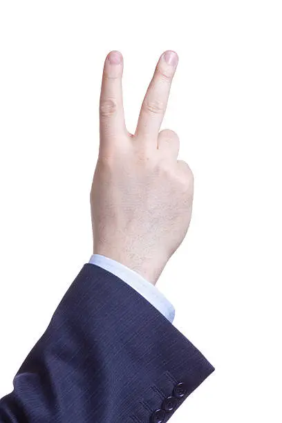 Man showing two fingers against white background