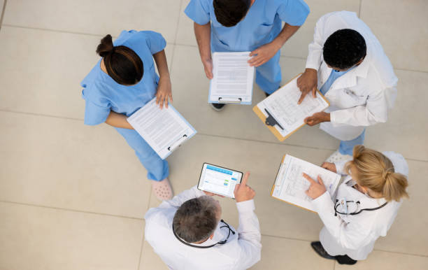 istock Group of doctors talking at the hospital 1442078147