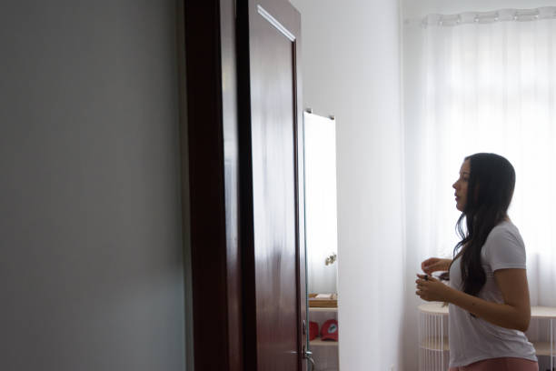 istock Young girl getting ready in the mirror 1442082580