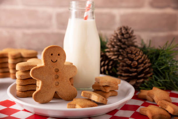 istock Homemade Gingerbread Man Cookies and Milk 1442085242