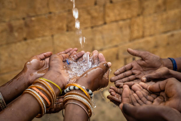 istock Poor Indian children asking for fresh water, India 1442086428