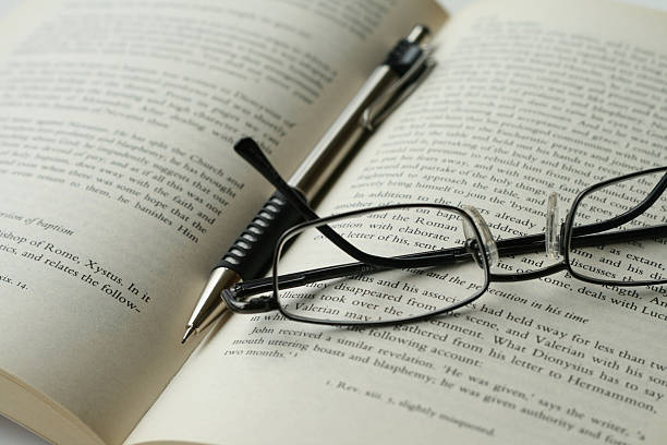 Book, Pen and Glasses stock photo
