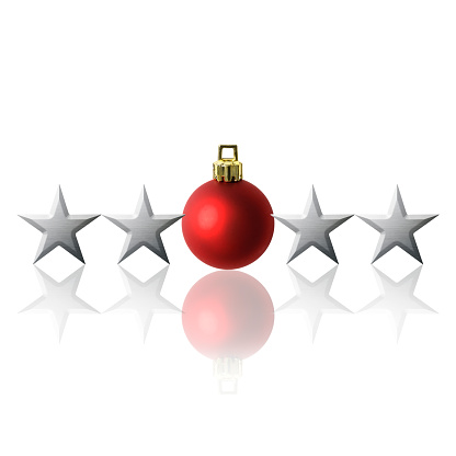 Row of silver stars with red Christmas ball on white background.