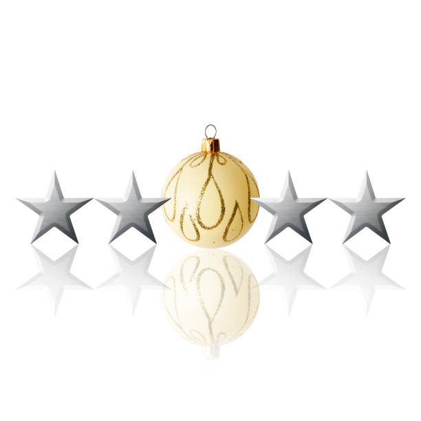 Row of silver stars with white Christmas ball on white background.